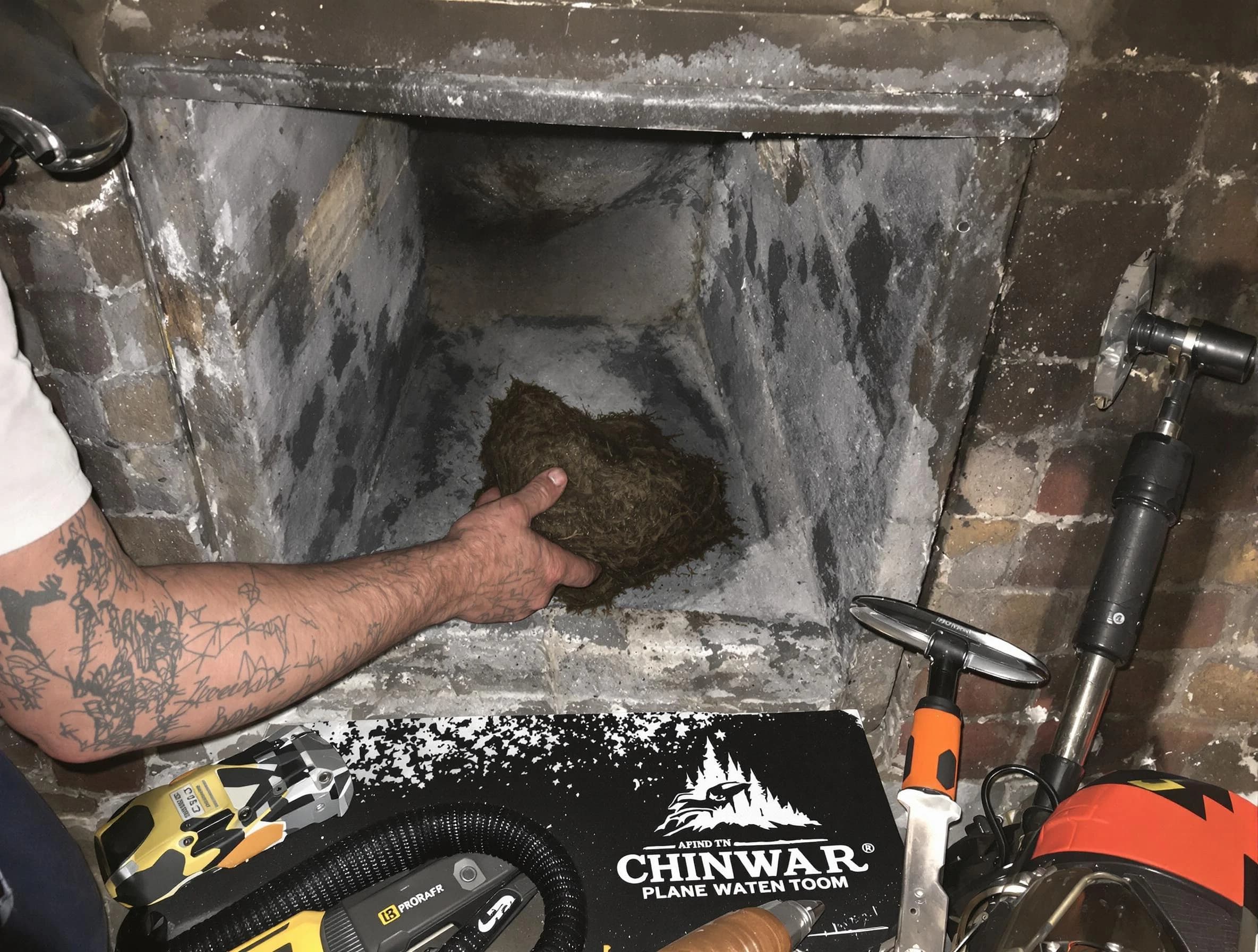 North Bergen Chimney Sweep safely removing debris and screening chimney in North Bergen, NJ
